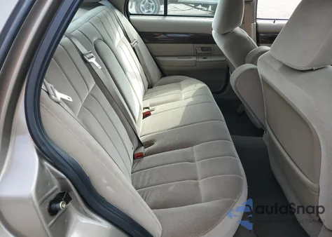 2004 Mercury Grand Marq z USA, uszkodzony, nr VIN 2MEFM74W64X617317